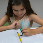 Girl holding calming clips