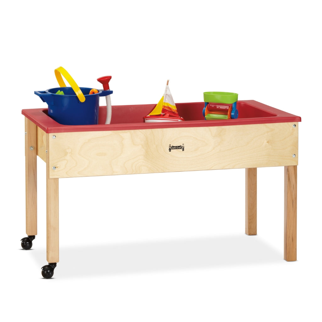 Children's play table with a red top and various toys on a white background