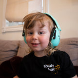 toddler wearing noise canceling headphones