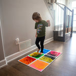 boy walking on liquid textured floor tiles