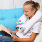 Girl with unicorn neck pillow